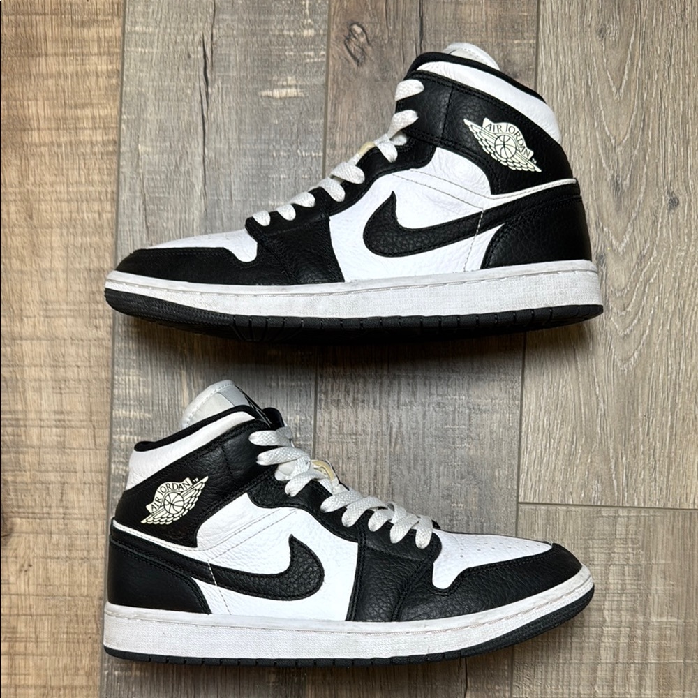 Nike Woman’s Jordan 1 Black and White Sneakers